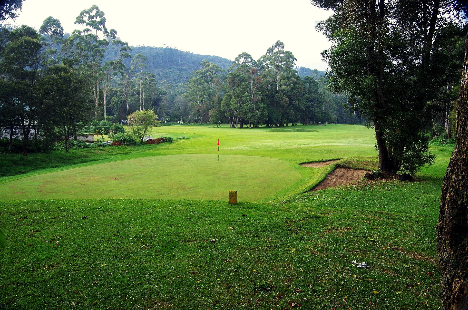 Fairway at Nuwara Eliya Golf Club with the hills of tea country behind